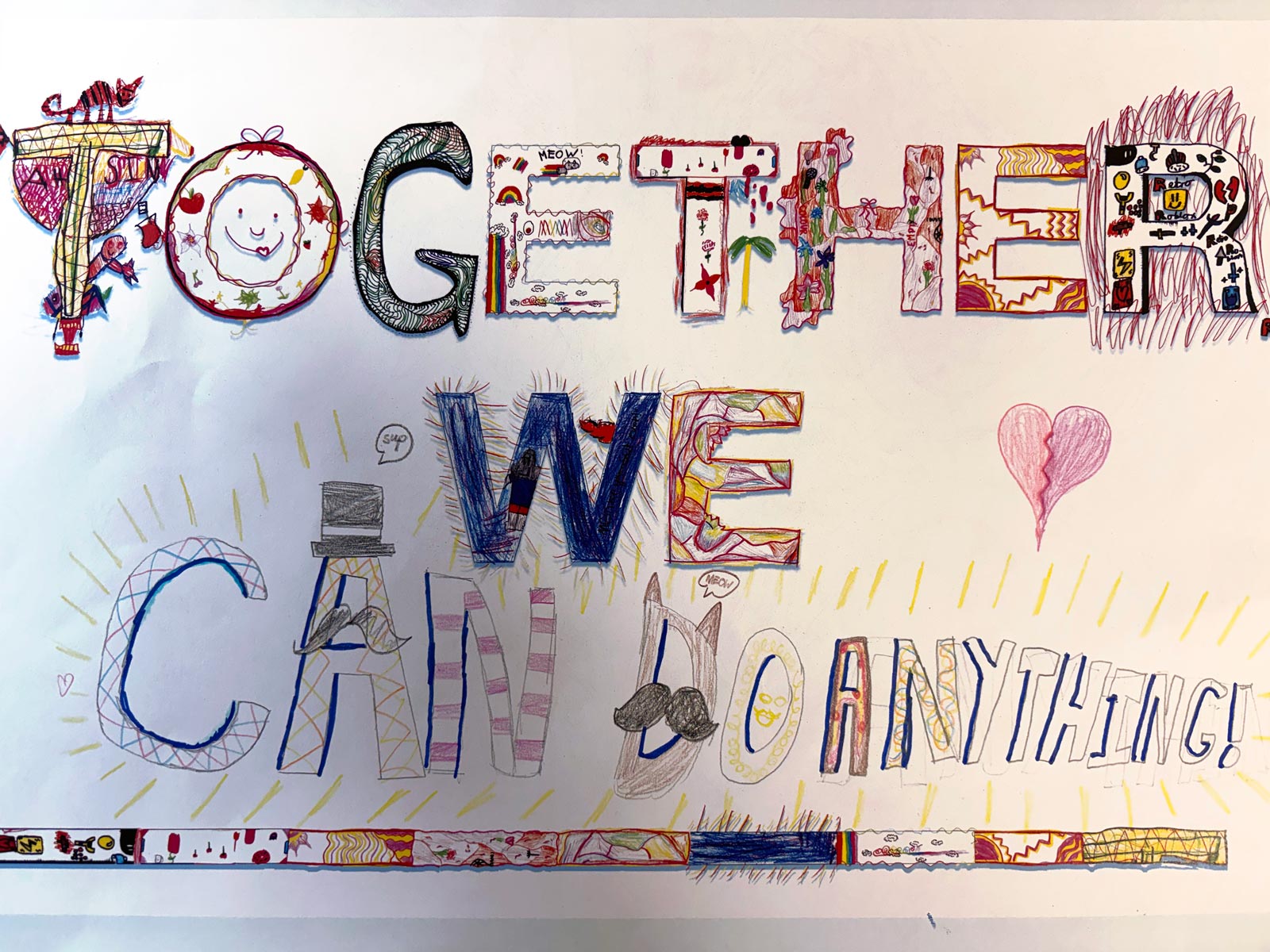 A child's reworking of what Together We might mean. In this instance they have written Together We "can do anything!".